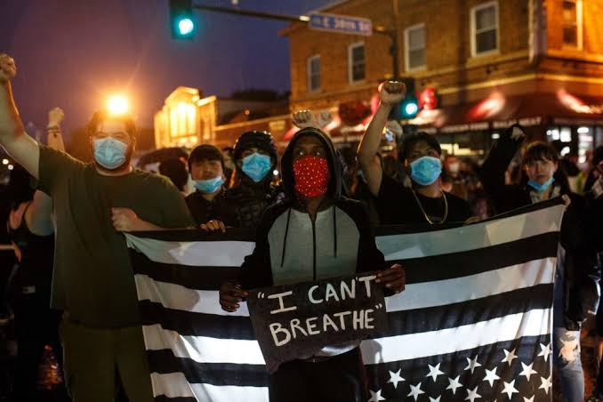 Demonstrators, lifting play cards with slogans 'I can't breathe', rushed to the streets of Minneapolis, in support of justice to an unarmed black man George Floyd, who was detained by the police for being involved in forgery and one of the officer, after banged him in the ground, put their knee on his throat, so he could not breathe. He died right after he was rushed to the hospital.