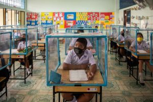 School In Thailand Uses Plastic Pens To Separate Pupils During Pandemic 